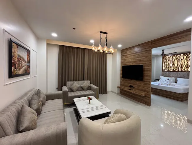 Suite room at Anandi Bhawan by Paandora Vrindavan with separate seating and wider room layout