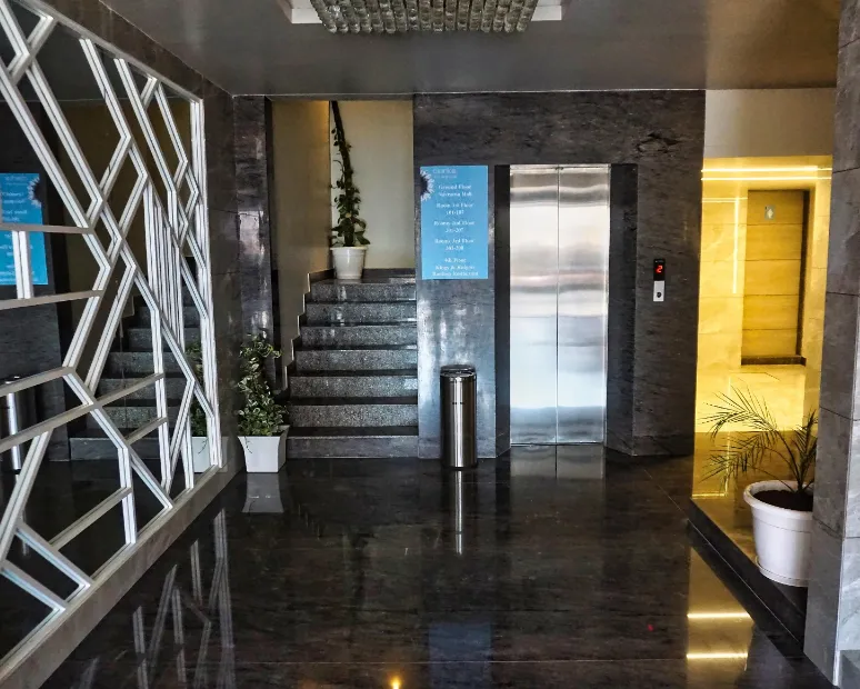 Front entrance of Clarks Inn Express Udaipur displaying signage and driveway access