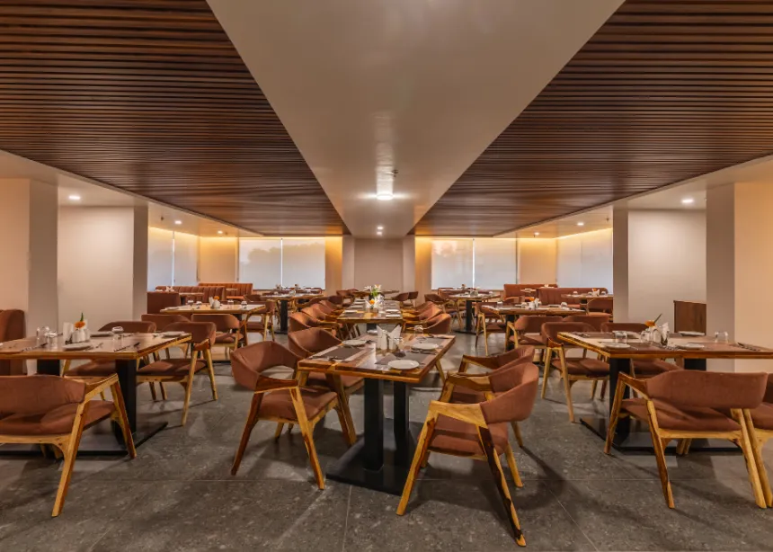 Swimming pool at ClarksInn Suites Jaipur with pool deck and surrounding open space