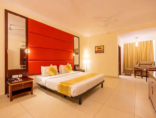 Premium garden view room at Crestmont Ashapurna Jaipur overlooking landscaped outdoor area