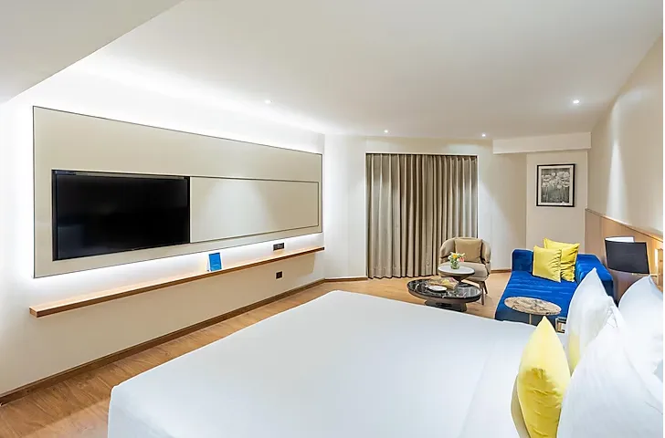 Presidential suite at Golden Tulip Jaipur showing spacious living area and premium interiors