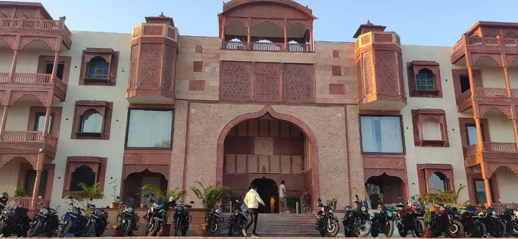 Entrance view of Heena Heritage Resort Jaipur with exterior façade and driveway access