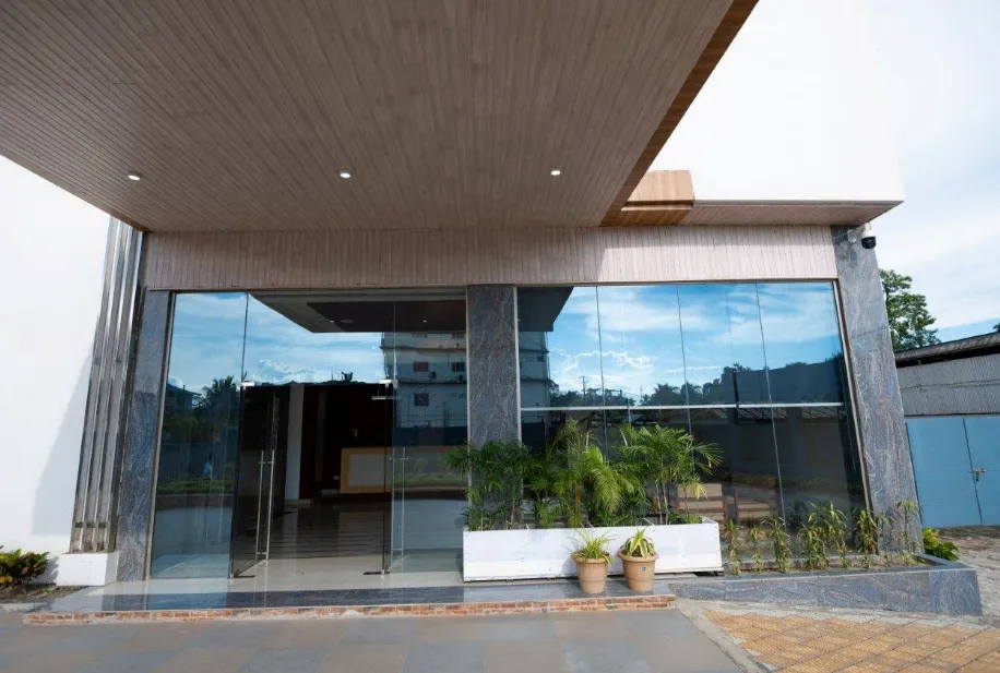 Main entrance of Pushkara Sarovar Portico hotel in Dibrugarh