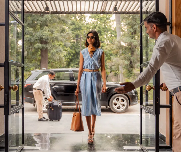 Hotel entrance of Modi Estate - AM Hotel Kollection Meerut displaying exterior façade and driveway access
