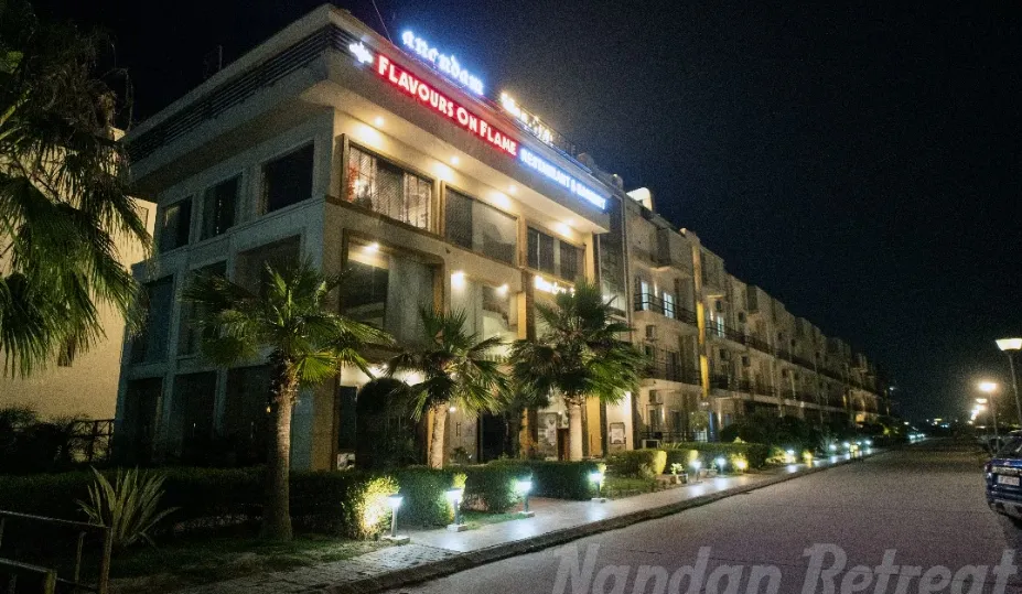 Hotel entrance of NANDAN RETREAT Vrindavan showing exterior structure and guest arrival area