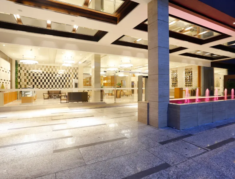 Hotel entrance of Nataraj Sarovar Portico-Jhansi Gorakhpur with exterior facade and driveway access