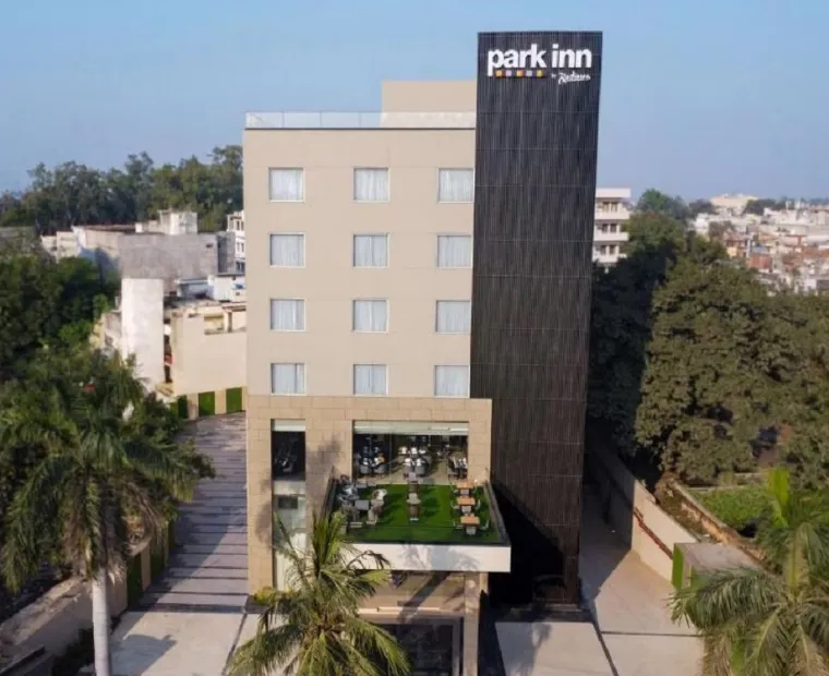 Hotel entrance of Park Inn by Radisson Ayodhya showing exterior façade and driveway access