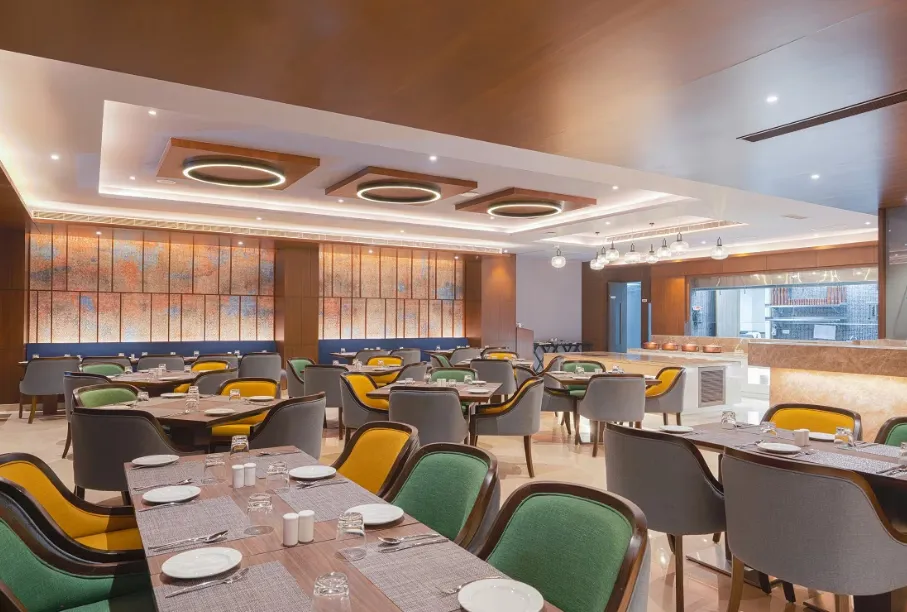 Restaurant at Park Inn by Radisson Ayodhya with dining tables and contemporary interior design