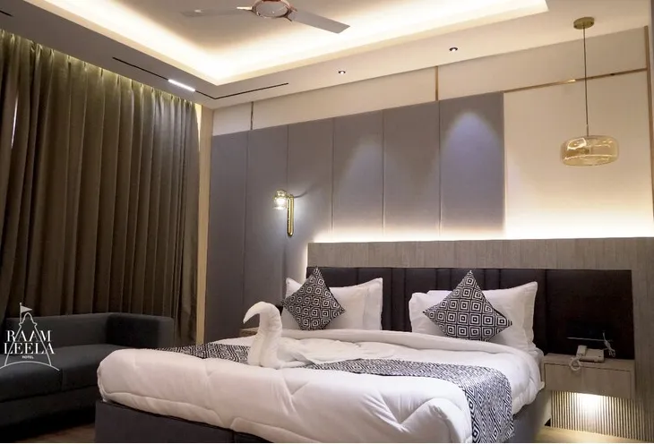 Superior room at Raam Leela Hotel Ayodhya with enhanced furnishings, bed setup, and calm ambience