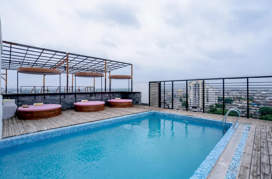 Restaurant interior at Ramada by Wyndham Jaipur displaying dining tables and service layout
