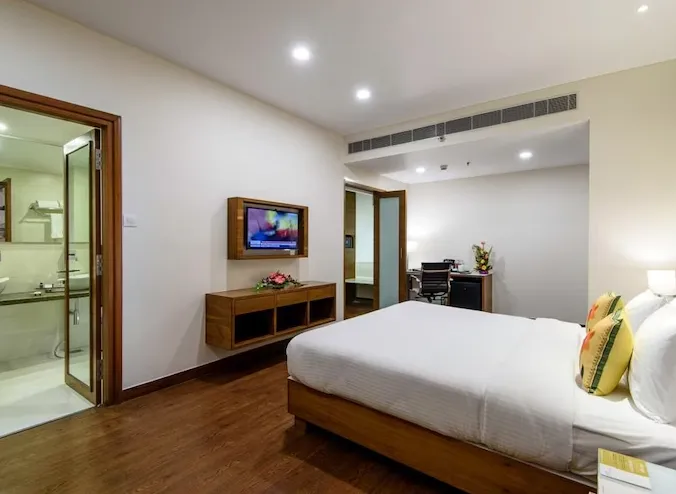 Executive room at Regenta Central Jaipur with work-friendly desk and controlled lighting