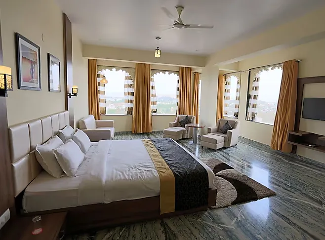 Regenta-Central-Mewargarh-udaipur-premier-lake-view-king-size-bed-room