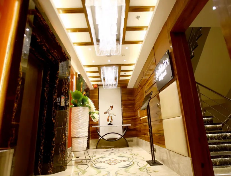 Hotel entrance of Regenta Central The Crystal, Kanpur displaying exterior structure and driveway access