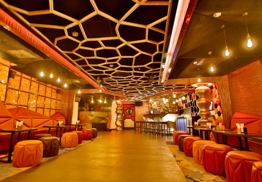 Restaurant at Regenta Central The Crystal, Kanpur showing dining tables, chairs, and clean interior setup