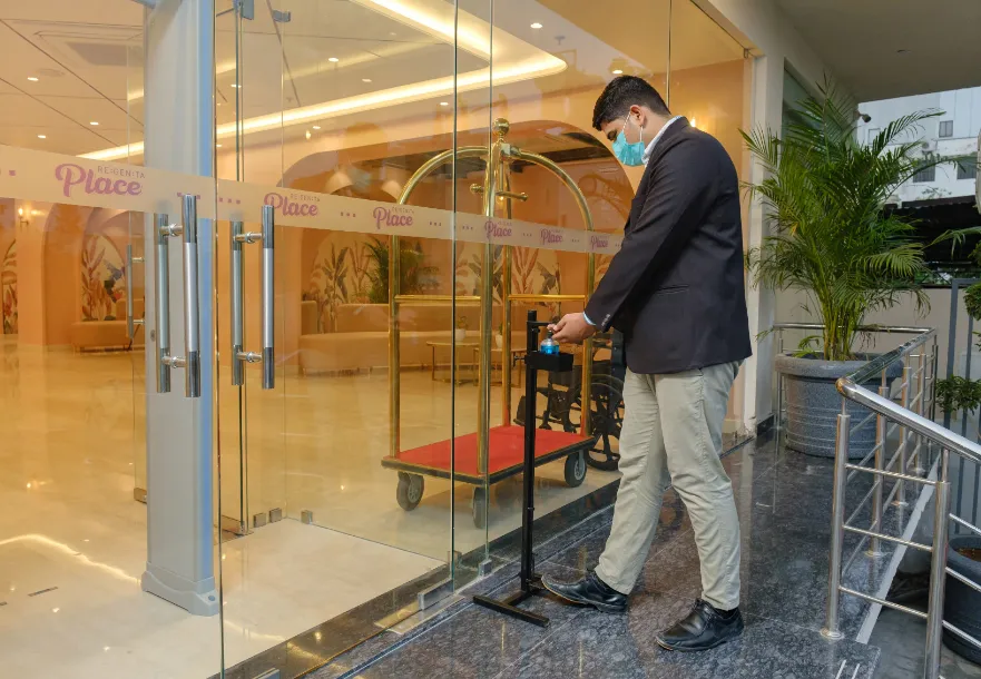 Front entrance of Regenta Place Jaipur displaying building exterior and driveway area