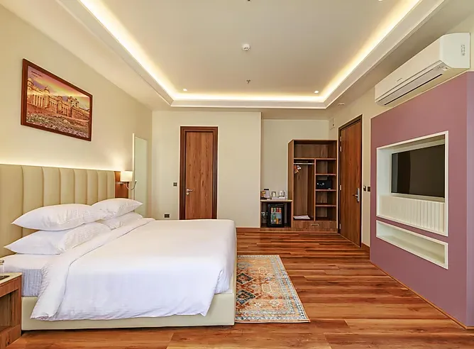 Executive room at Regenta Place Jaipur with work desk, chair, and structured interiors