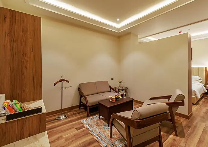 Suite room at Regenta Place Jaipur with extended living space and organized layout