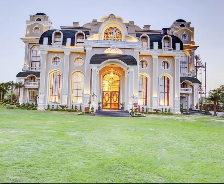 Hotel entrance of Sarovar Portico Saharanpur with branded signage and driveway access