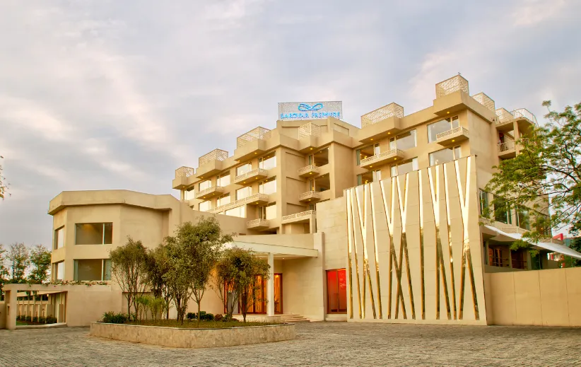 Front entrance of Sarovar Premiere Jaipur with modern façade and driveway access