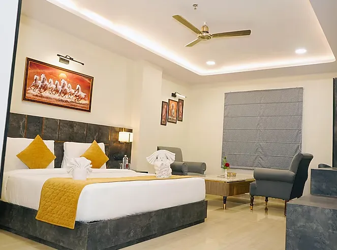 Superior room at Shrigo Hotels Banaras Varanasi with polished interiors and well-lit sleeping area