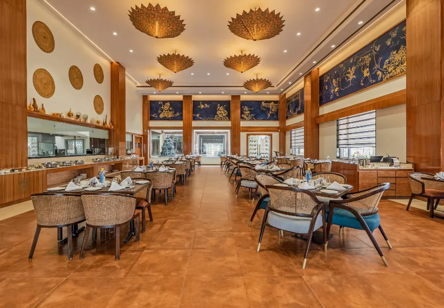 Restaurant at Shyama Sarovar Portico Orai with dining tables and organized interior setup
