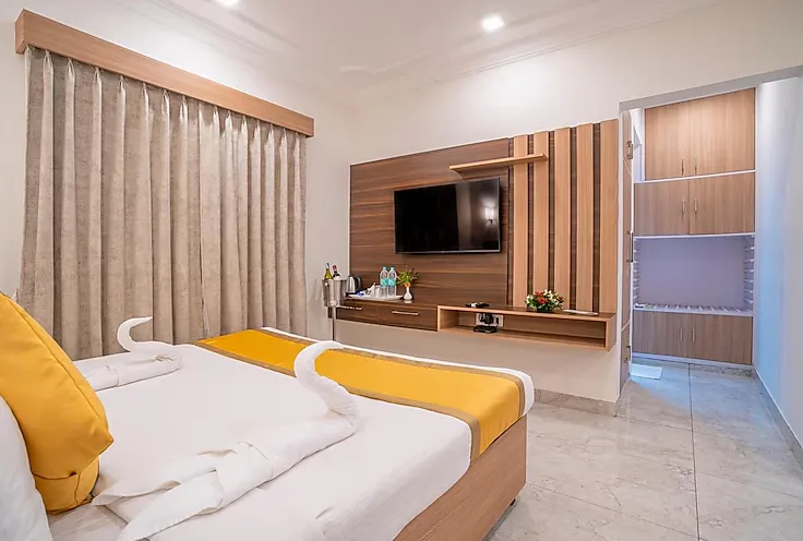 Deluxe room at Toshali Sands, Puri featuring spacious interiors and private sit-out