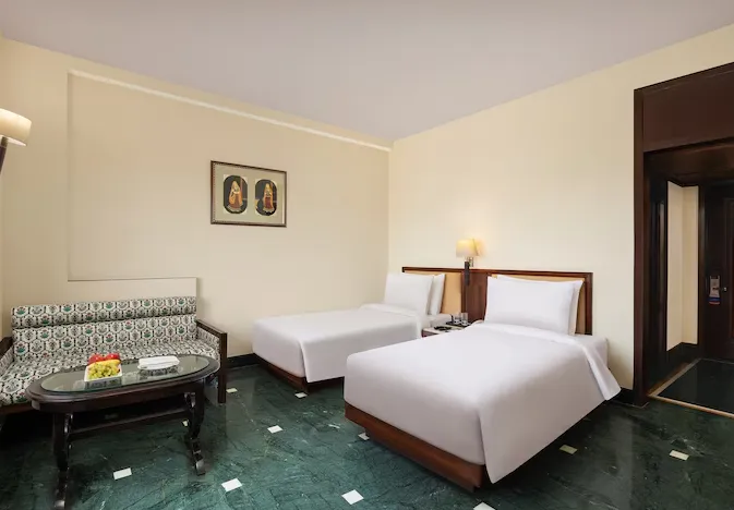 Deluxe room at V Sarovar Portico MI Road Jaipur with comfortable bedding and work-friendly space