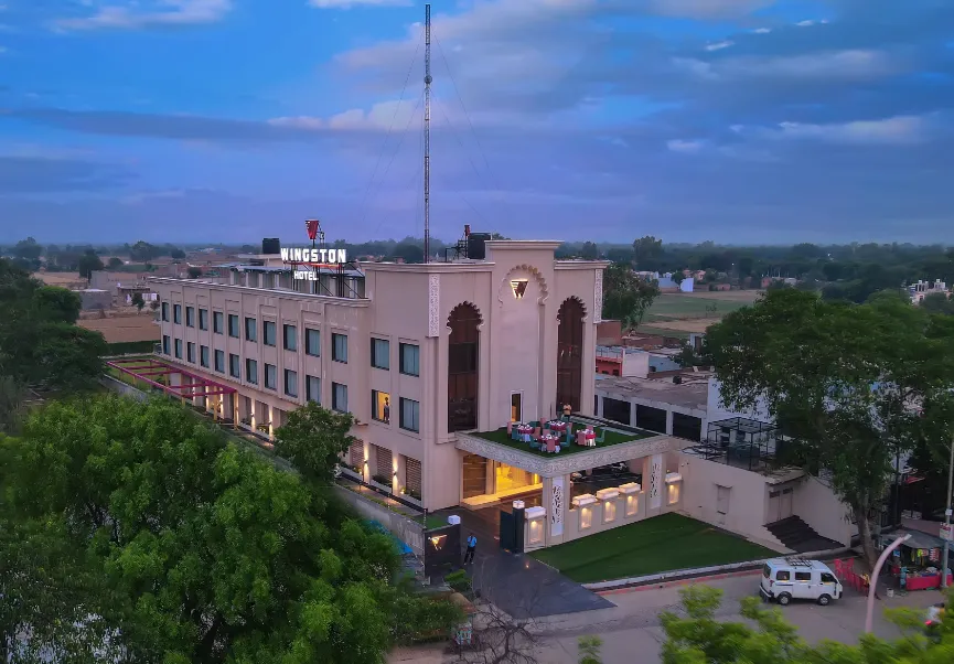 Entrance view of Wingston A TreeHouse Hotel Barsana Barsana showing exterior structure and access driveway