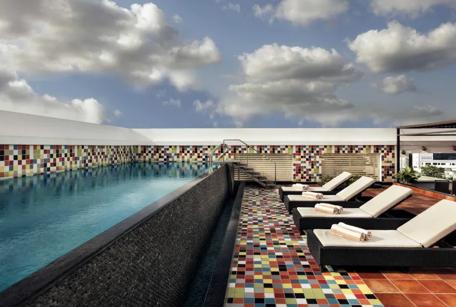 Swimming pool at Zone by The Park Hotel Jaipur with poolside area and open surroundings