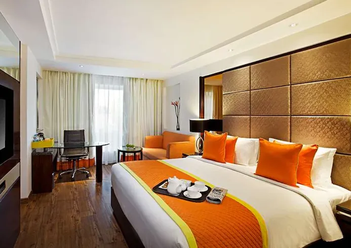 Zone deluxe room at Zone by The Park Hotel Jaipur featuring contemporary interiors and seating space