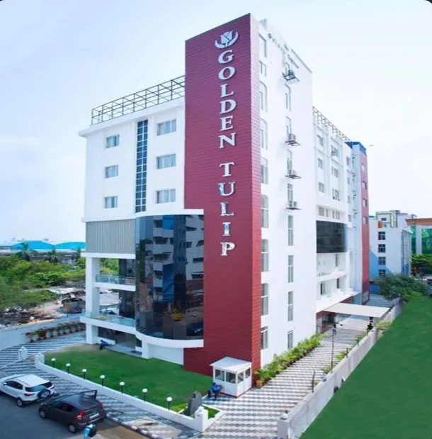 Entrance view of Golden Tulip hotel in Kolkata with elegant exterior design