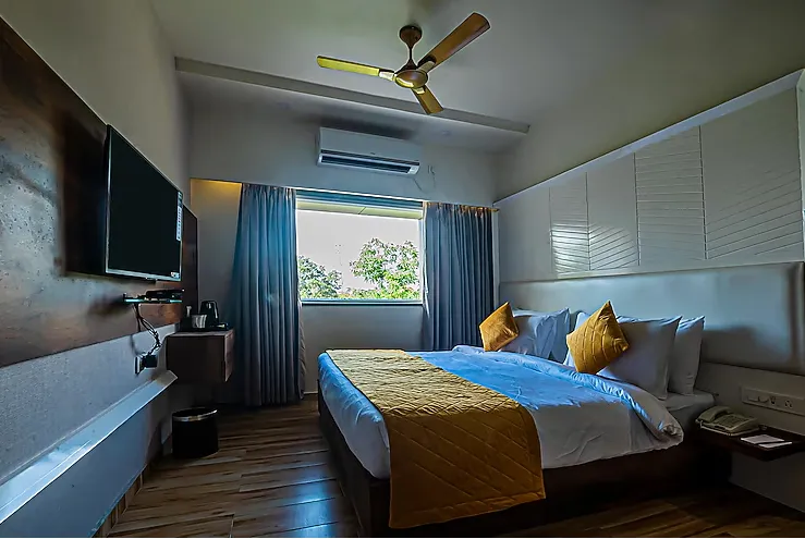 Deluxe room at Regenta Inn Sambalpur by Royal Orchid Hotels with spacious layout