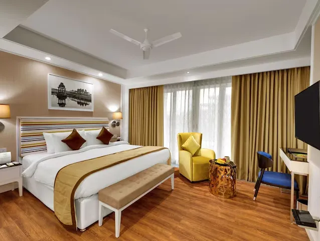 Amanora-The-Fern-Pune-winter-green-room-kingbed