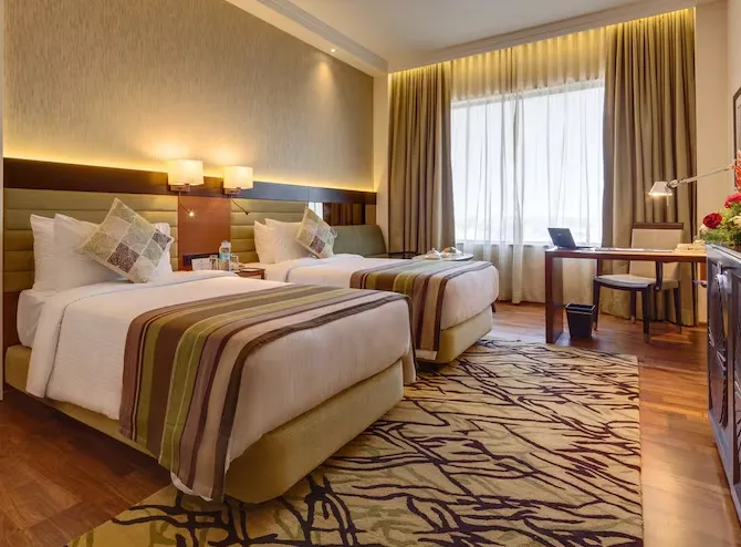 Balaji-Sarovar-Premiere-Solapur-deluxe-room-twinbed-poolview