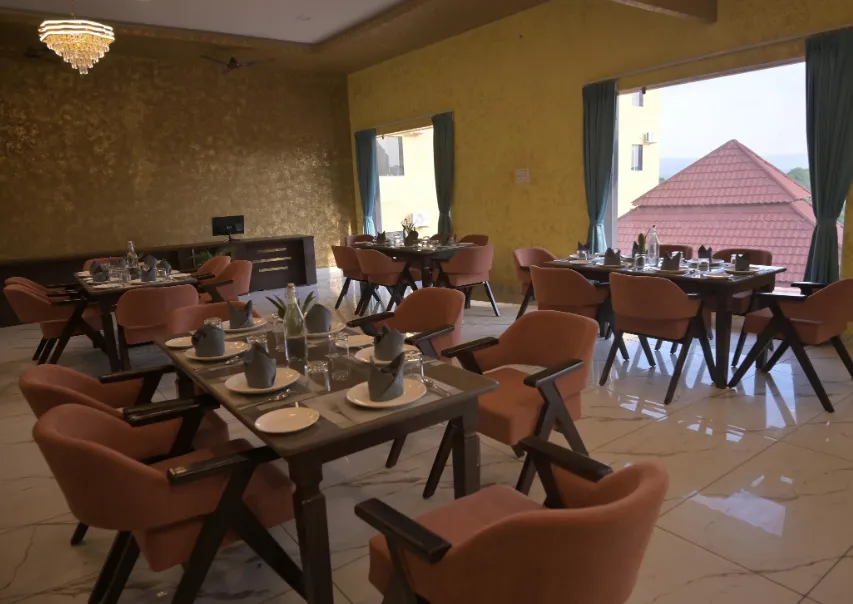 Restaurant at Clarks Collection Brahmas Resort Pushkar with dining tables and interior setting