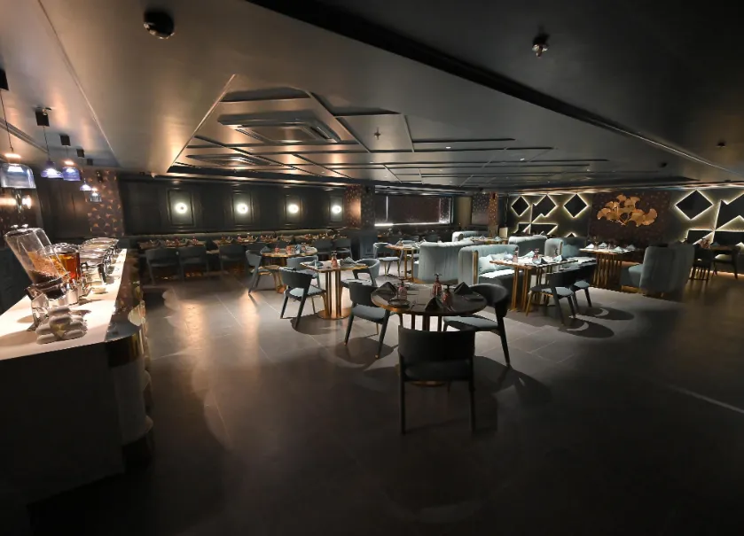 Restaurant at Clarks Collection Grand Sapphire Ajmer with dining tables and service setup