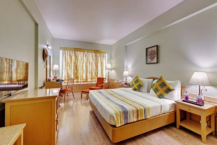 E-Square-The-Fern-Pune-winter-green-premium-room-kingbed