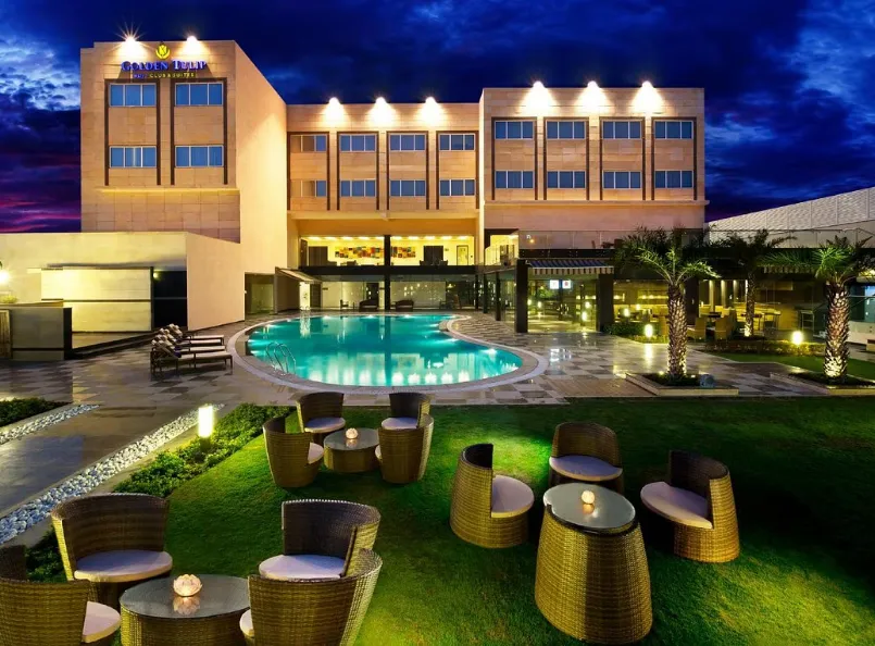 Entrance of Golden Tulip BDI Club And Suites Bhiwadi showing hotel façade and signage