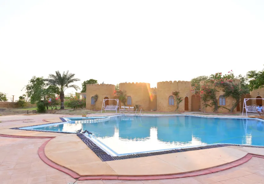 Restaurant at Himmatgarh Palace Jaisalmer with dining tables and interior décor