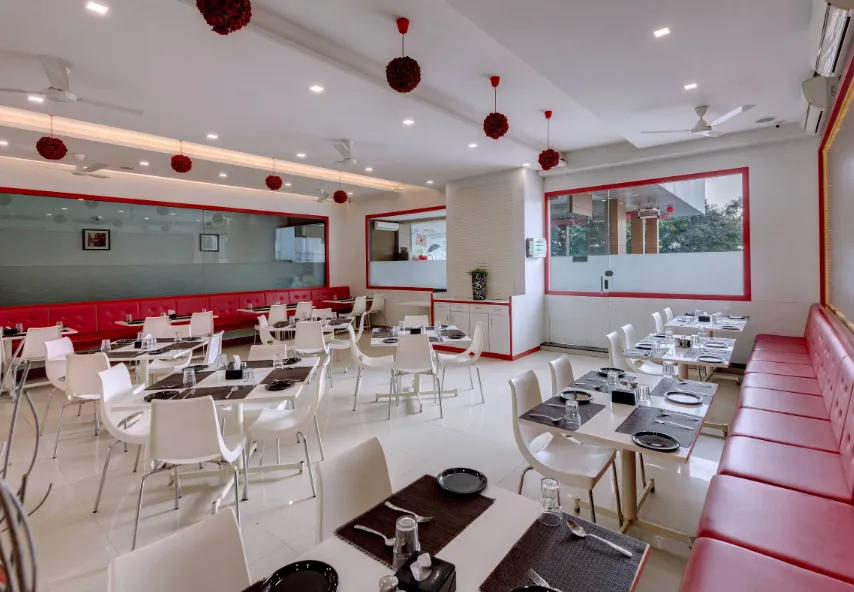Restaurant at Hotel Grand Fortune Beacon Kohlapur with dining tables and contemporary setup