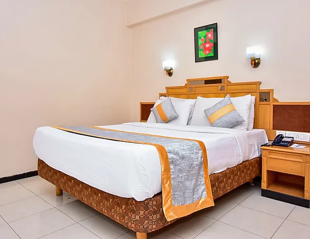 Deluxe Twin Room at Kalyan Residency Tirupati showing twin beds and décor