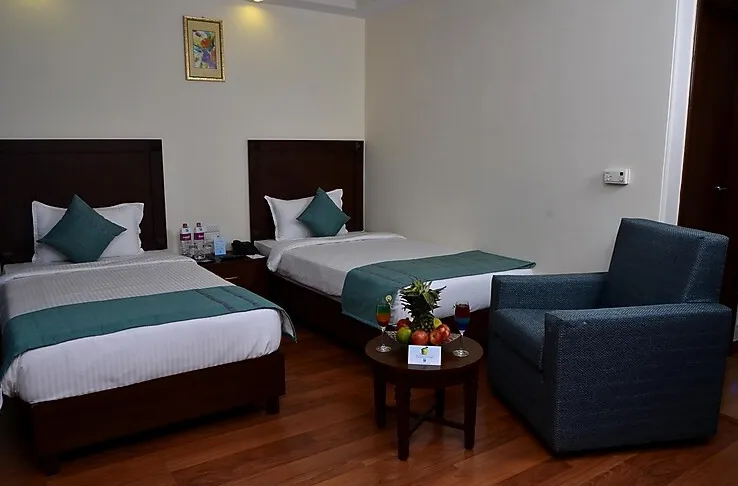 Superior room at Le Lac Sarovar Portico Ranchi with comfortable bed and work desk