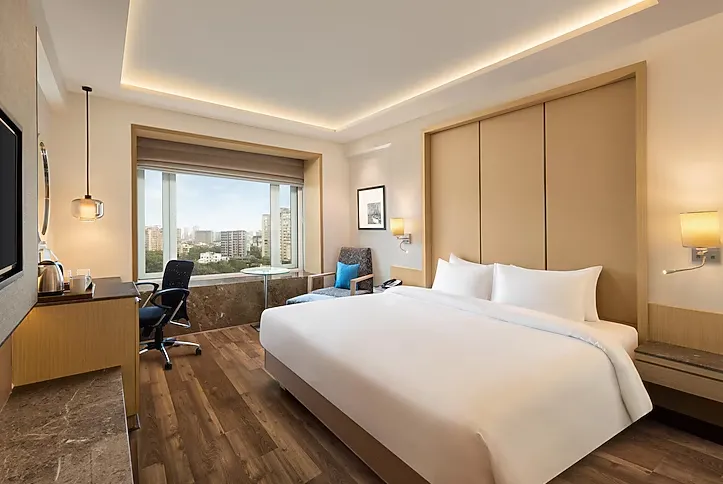 Superior room at Radisson Hotel Goregaon Mumbai with king bed and work desk