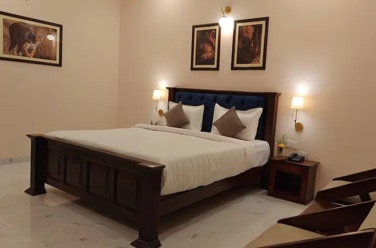 Superior room at Sundervan Vilas Ranthambore with bed, seating, and window light
