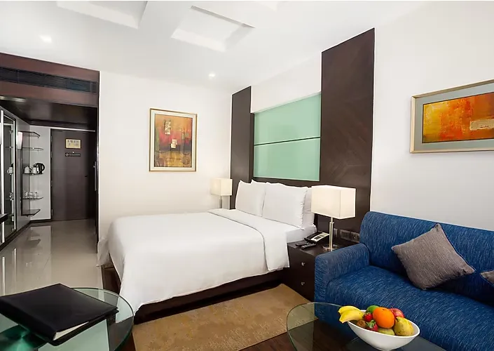 Executive room at The Residency Chennai with ergonomic chair and business desk setup