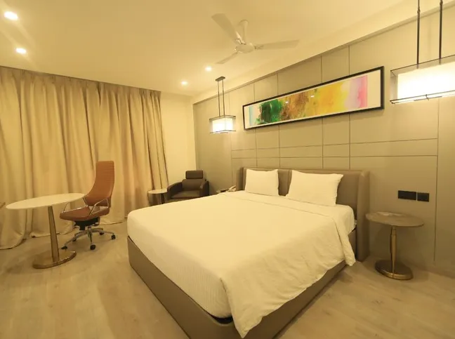 Restaurant at D.R. Utthama Hotel Nellore with arranged dining tables