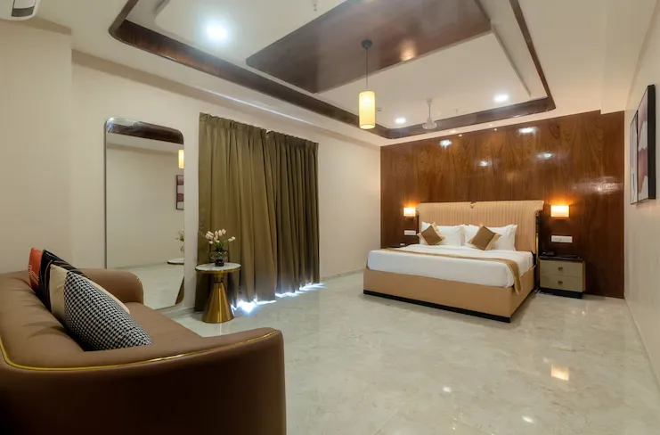 Suite at VITS Satyajeet Karad with separate living space and bedroom