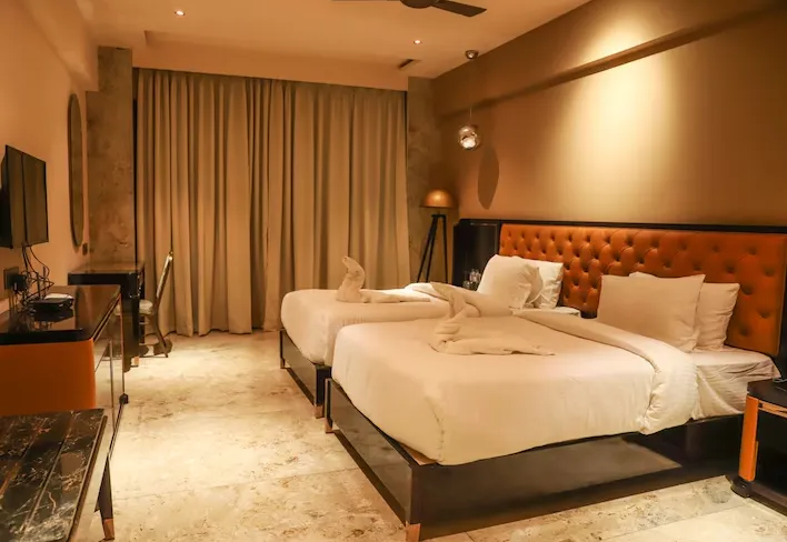 Executive room at Vits Hotels Nanded with workspace desk and contemporary interiors