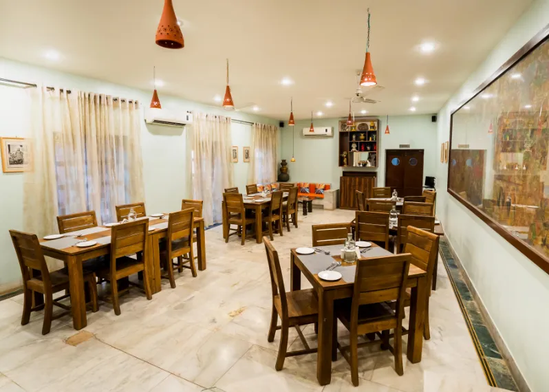 Restaurant at Zone Palace By The Park Phalodi with dining tables and décor