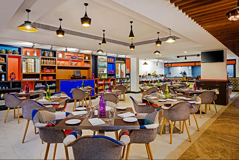 Restaurant at Zone by The Park Hotel Chennai with modern tables and buffet setup